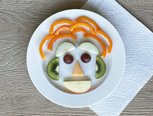 faces made out of fruit and vegetables